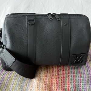 LOUIS VUITTON CITY KEEPAL 25